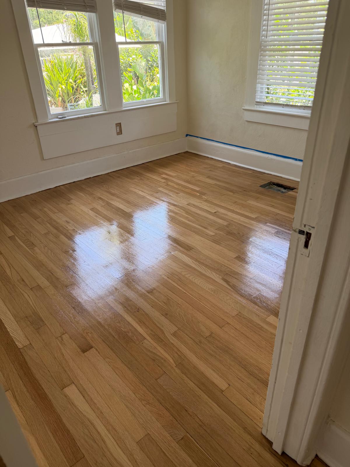 Same hardwood floor after professional refinishing