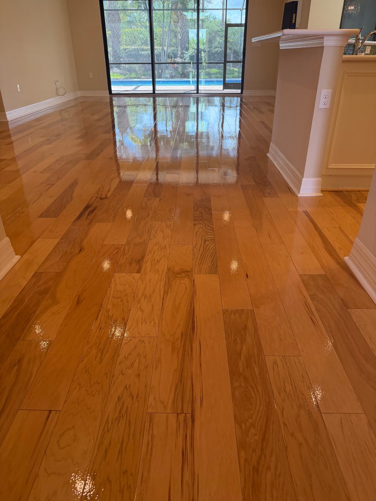 Professionally refinished hardwood floor in a Southwest Florida home